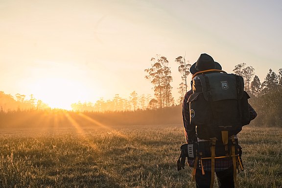 man-in-black-backpack-during-golden-hour-1230302.jpg 